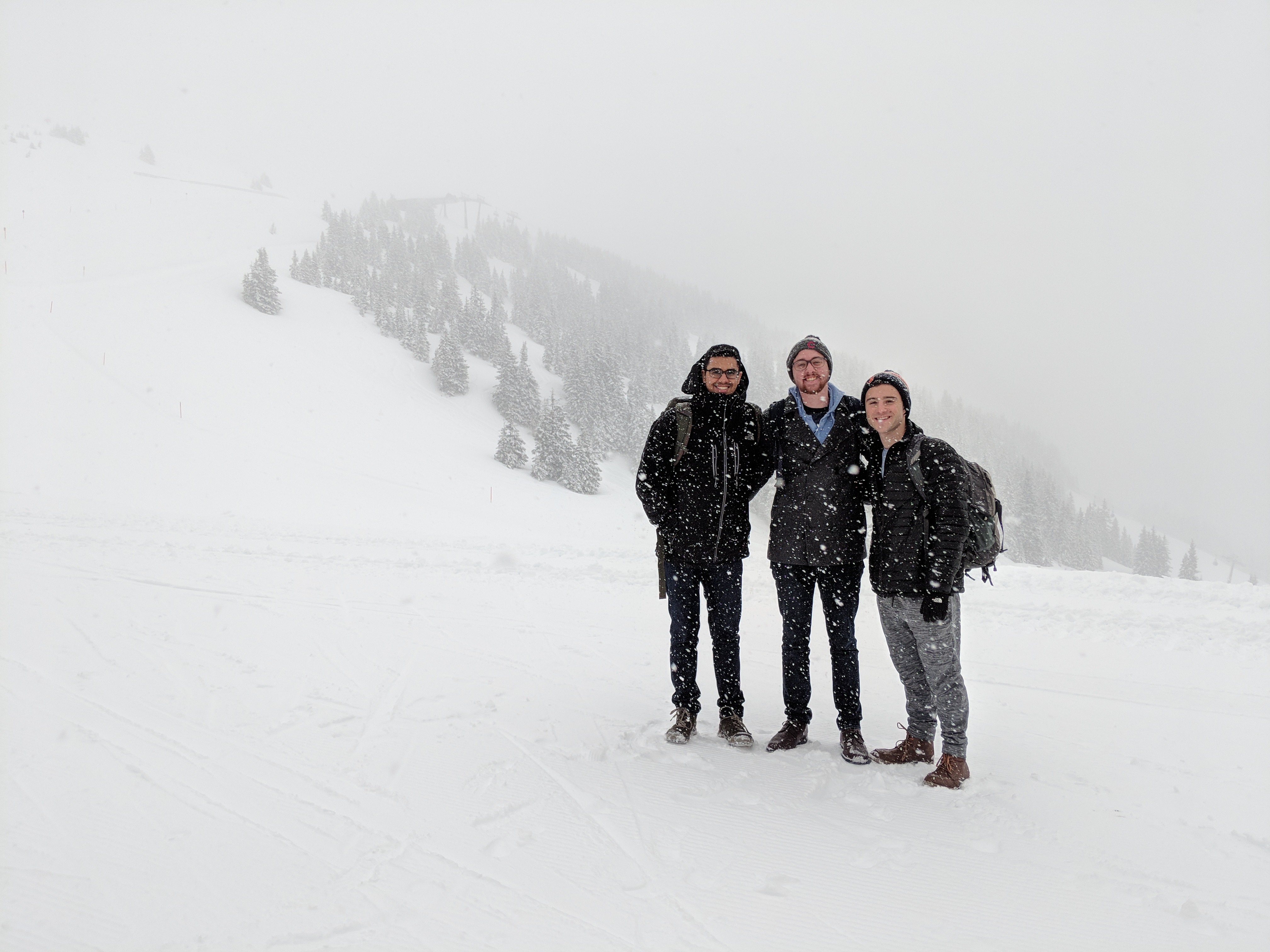 Econ Students Sam Bricker, Behram Lalji, & Ryan Ludwig during Ski Week outside the hotel (Spring 2018)