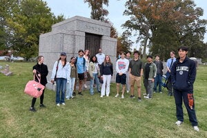 The Grave Walkers at their final destination, David Kinley's grave.