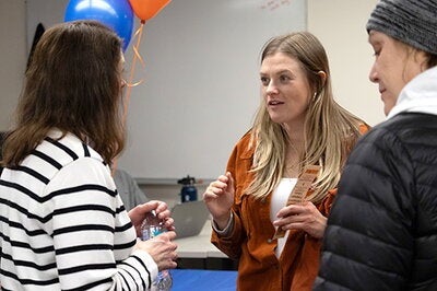 People discussing the newly renovated center